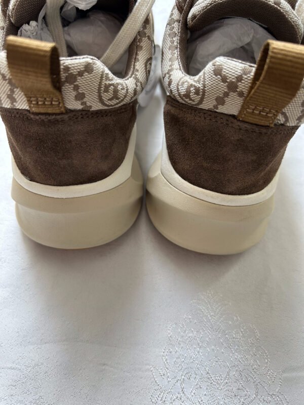 33 TB Tory Burch Monogram Good Luck Trainer Sneakers