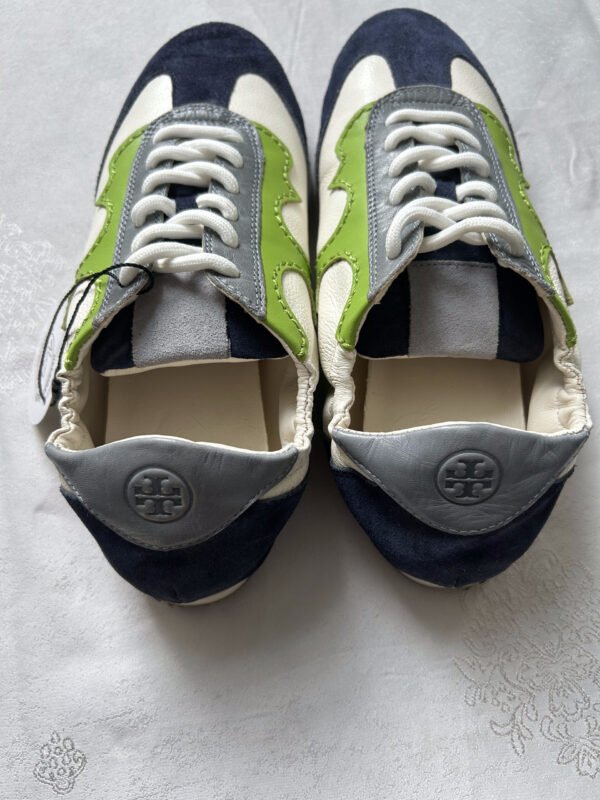 46 TB Tory Burch Serif Sneaker
