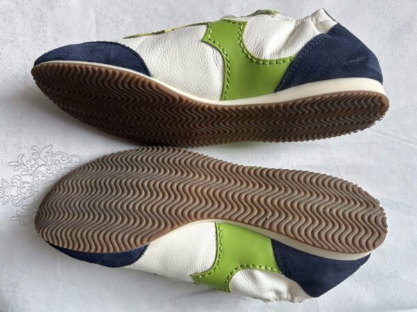 46 TB(1) Tory Burch Serif Sneaker
